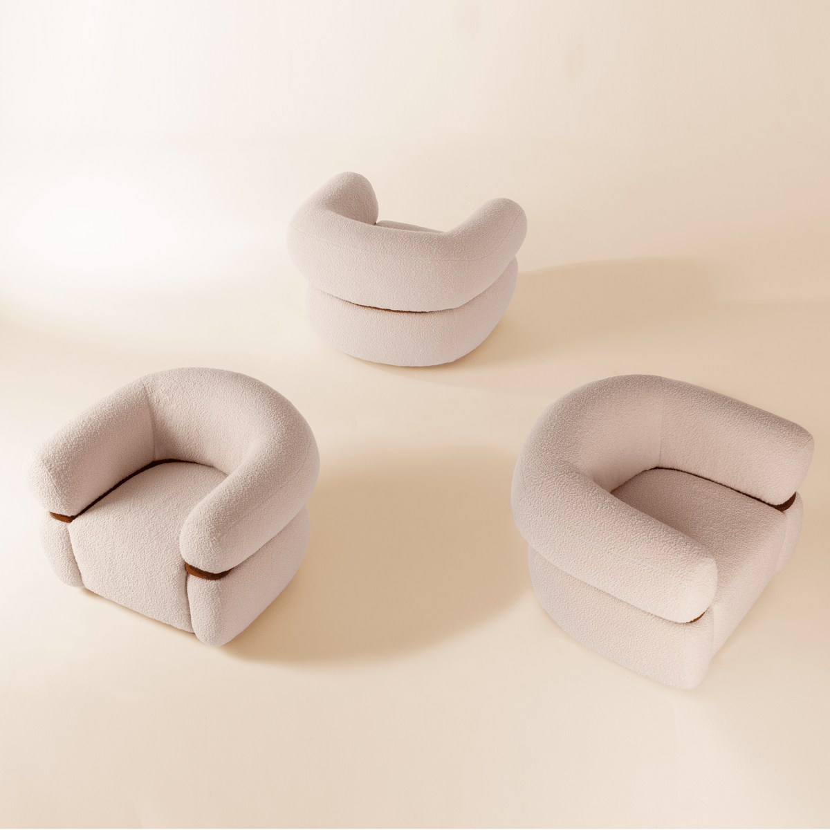 Malibu Armchair trio in ivory Bouclé from above on a beige floor