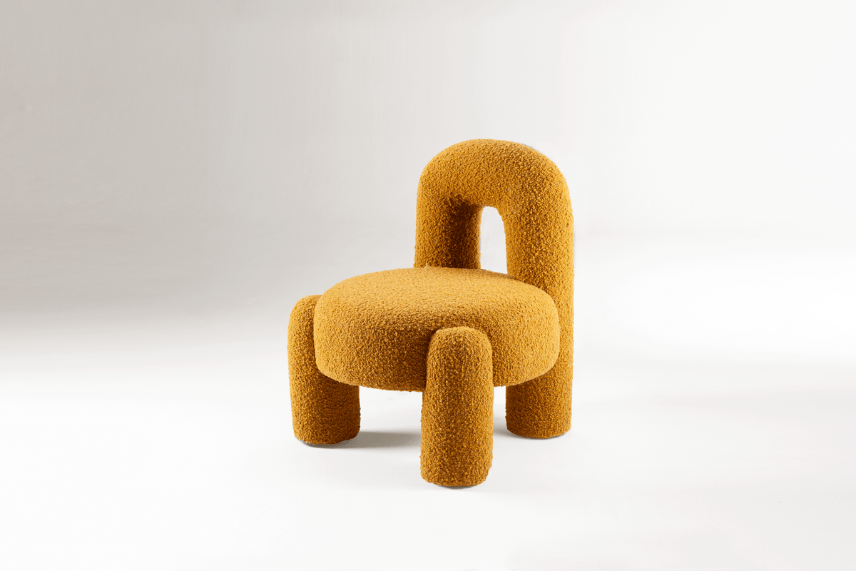 Marlon Armchair in mustard bouclé, three-quarter view