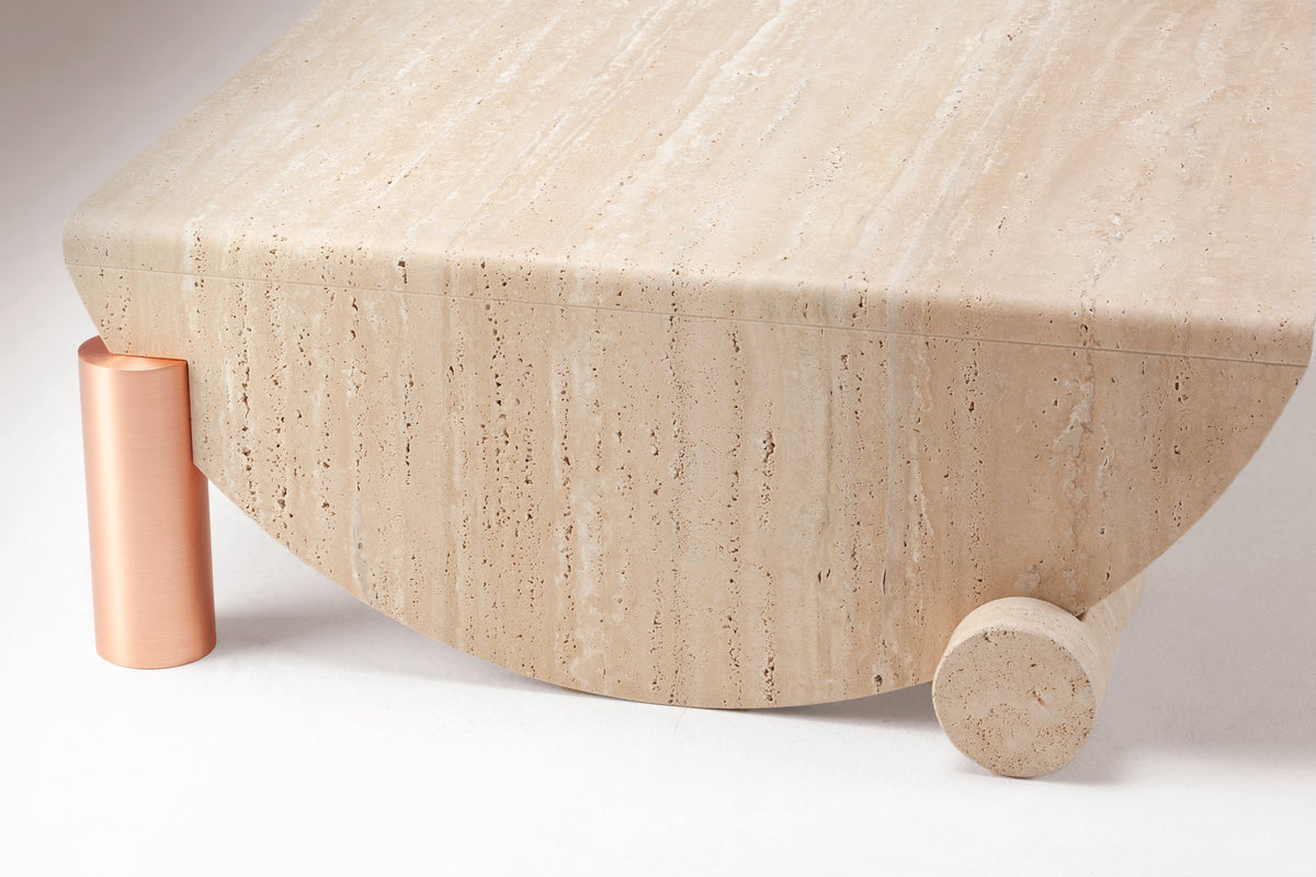 Playing Games Travertine Coffee Table close-up of the copper leg and travertine roll