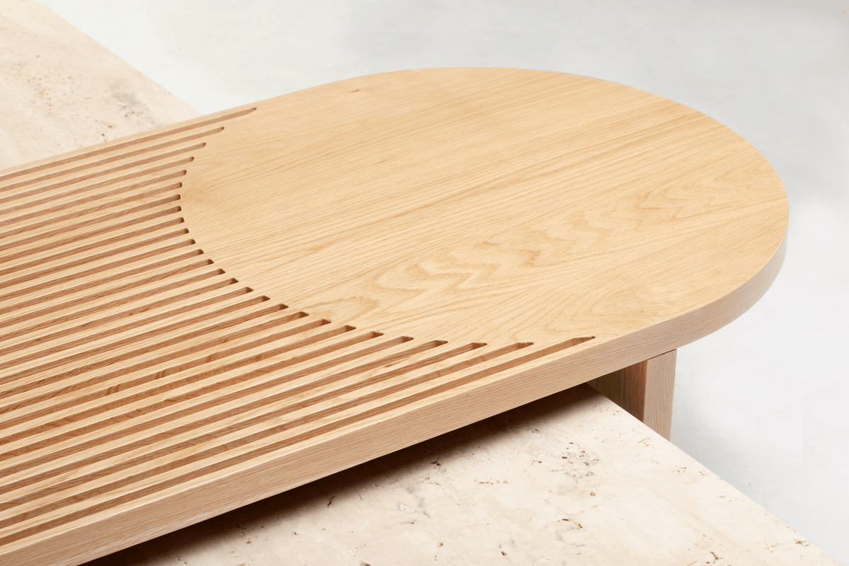 Stick and Stone Coffee Table close-up of the ribbed oak top over travertine