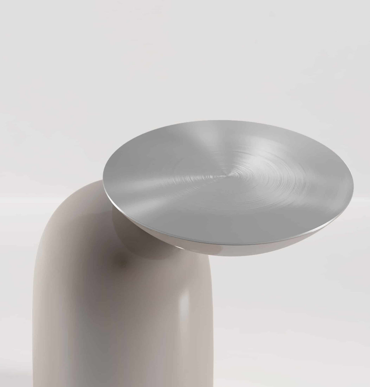 Pingu Side Table close-up of the brushed metal top on a taupe lacquered base