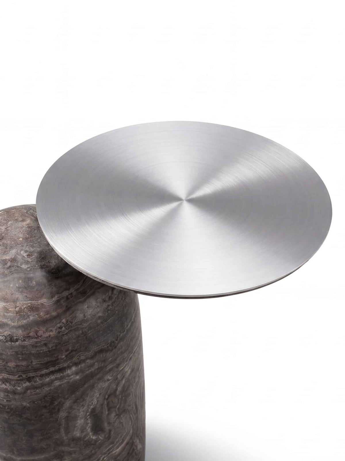Pingu X Side Table, close-up of the Satin Aluminium top on grey marble