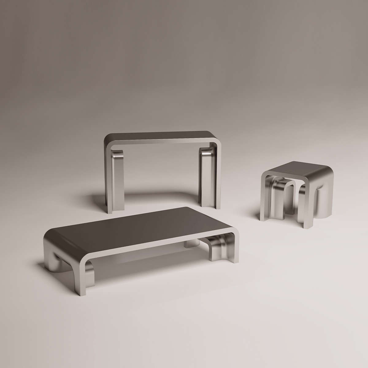 Plié Console in Polished Inox with matching coffee and side tables on grey
