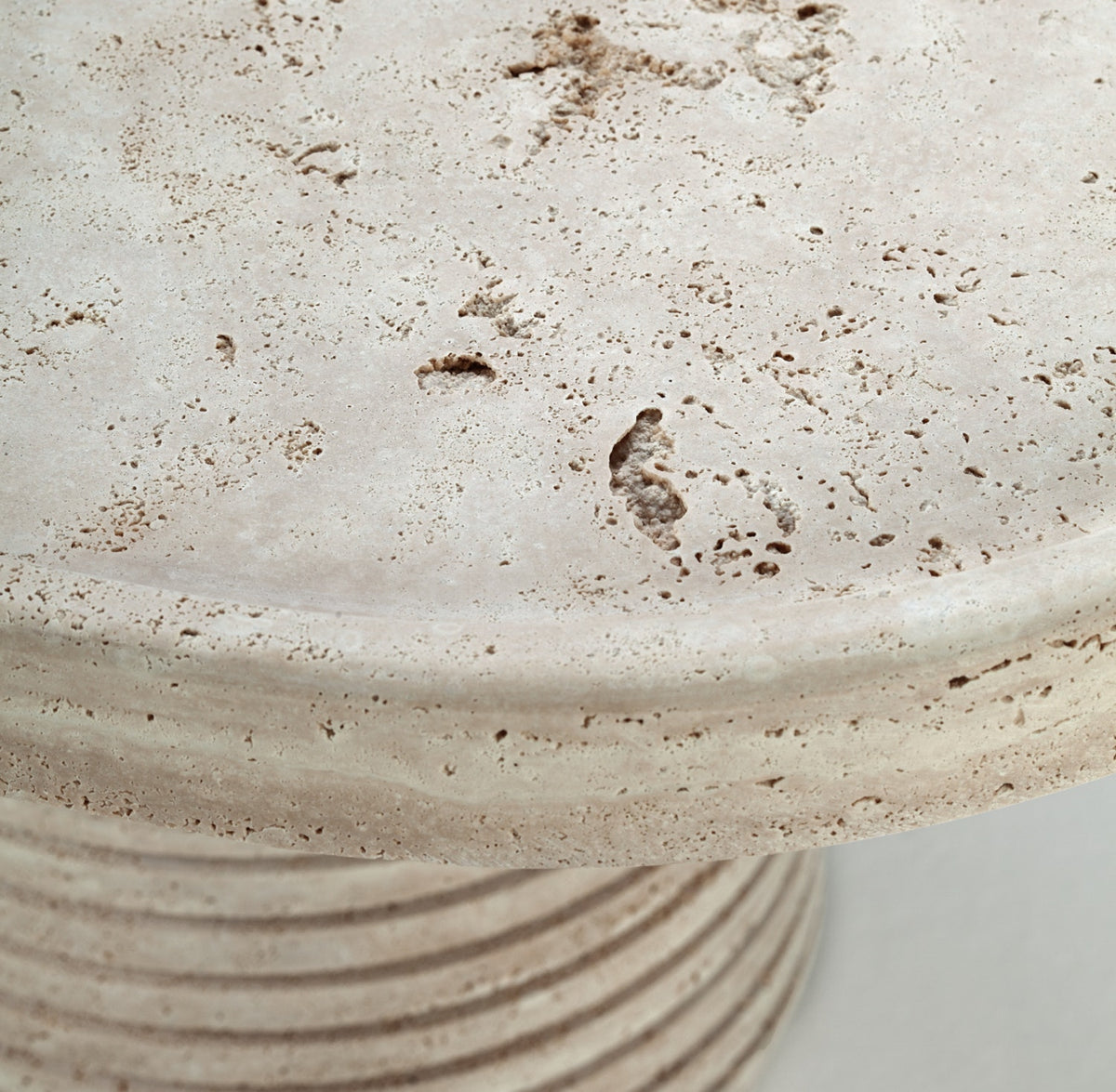 Poppy Console Table close-up of the travertine leg texture