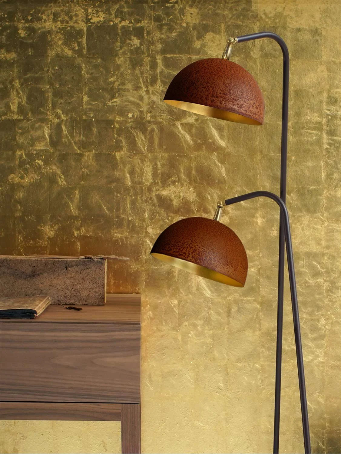 Mammalampa Queen Floor Double Lamp with two corroded steel domes against a gold leaf wall