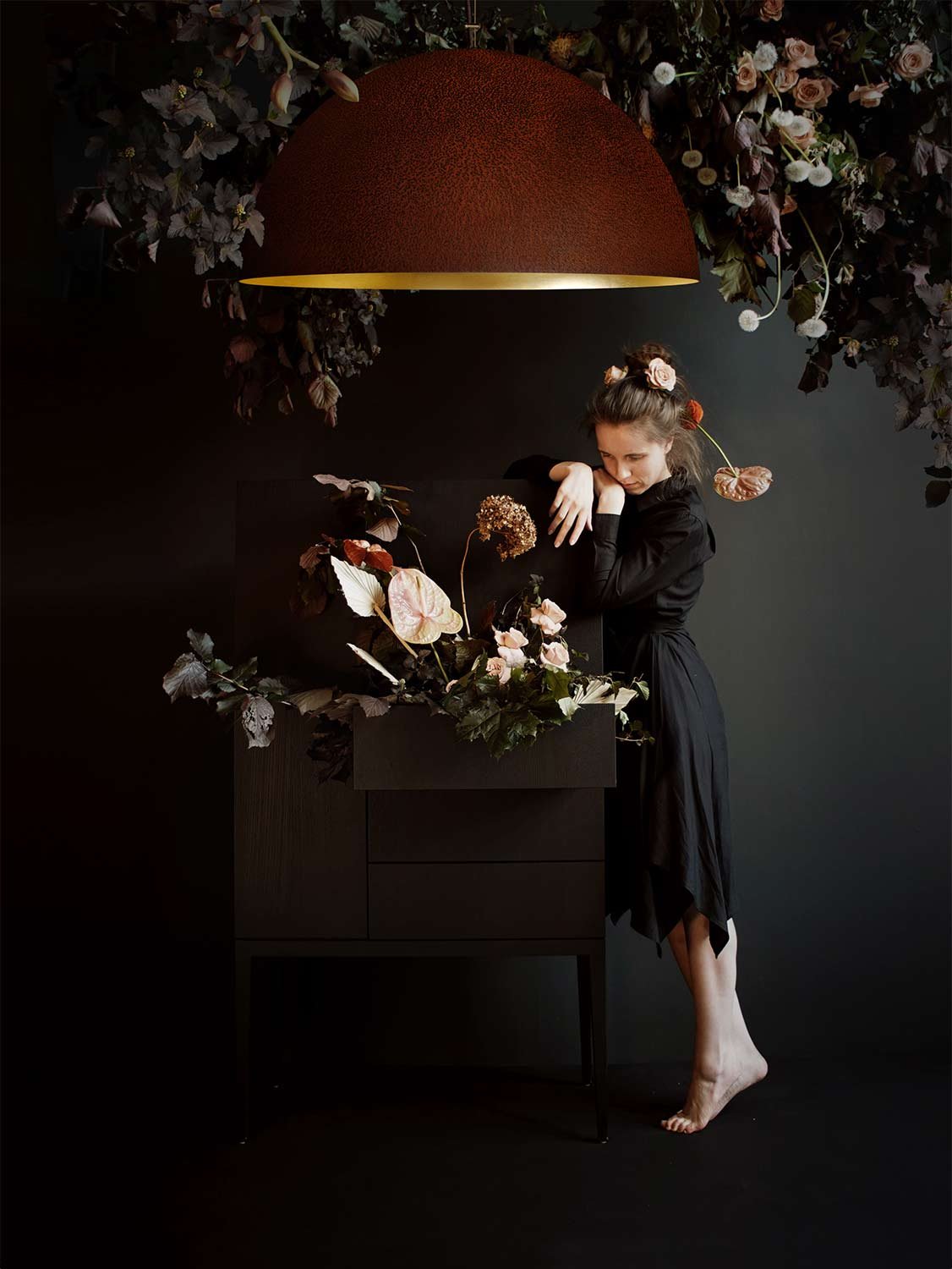 Mammalampa Queen Pendant Light, Extra Large, corroded dome lit over a floral sideboard