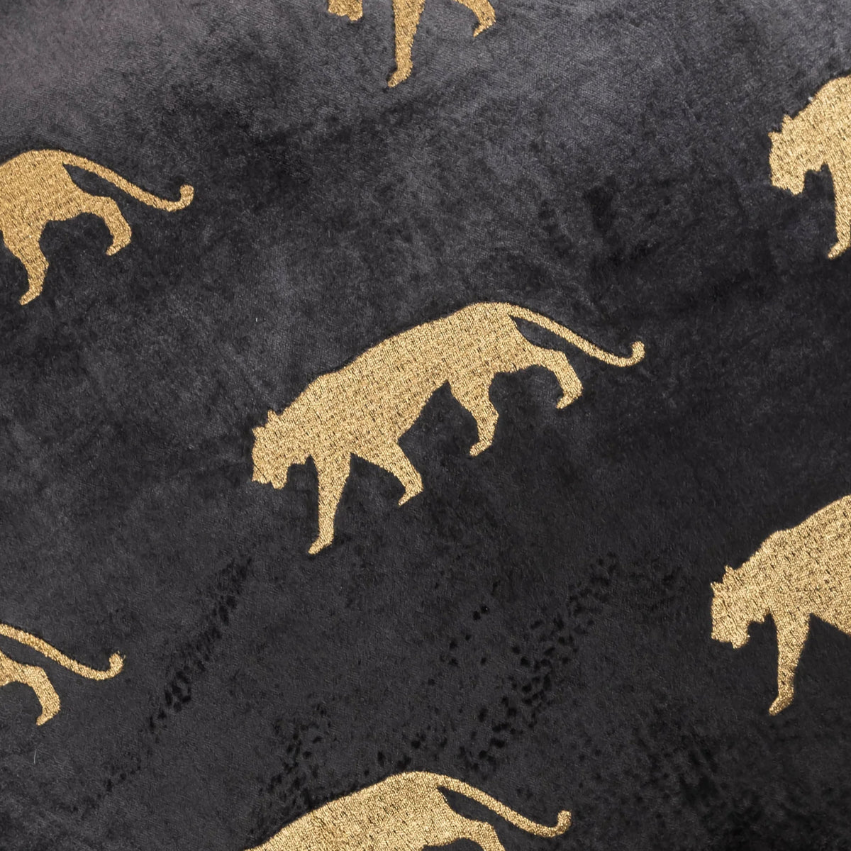 Rica Embroidered Pillow close-up of gold leopards embroidered on black velvet