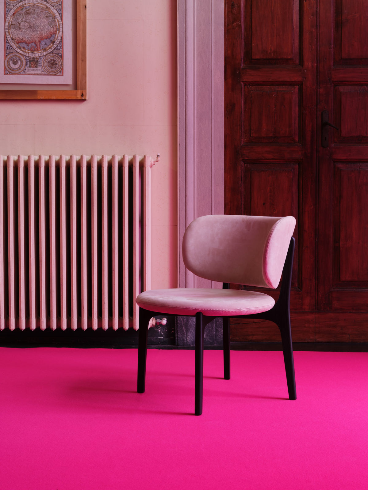 Richmond Lounge Chair in blush on a magenta carpet in a pink room