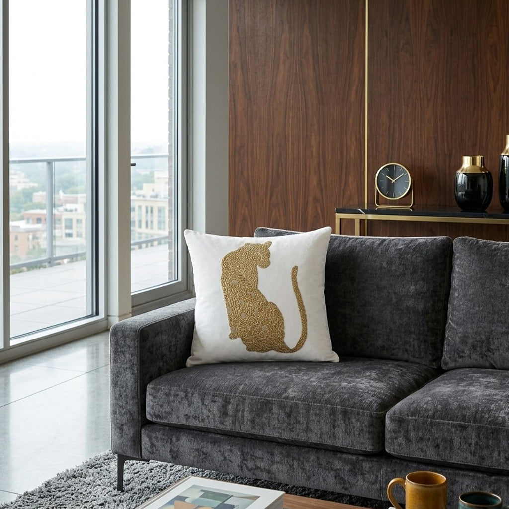 Safara Panther Ivory Gold Pillow, styled in a living room by Maison Burgos