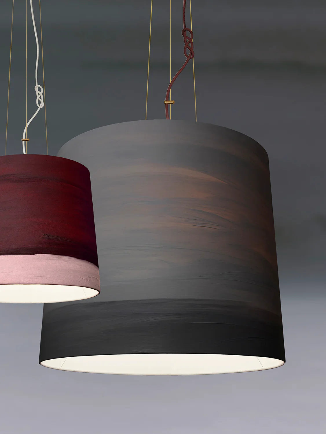 Mammalampa Sisters Pendant Light in hand-painted grey Mist canvas beside a burgundy shade