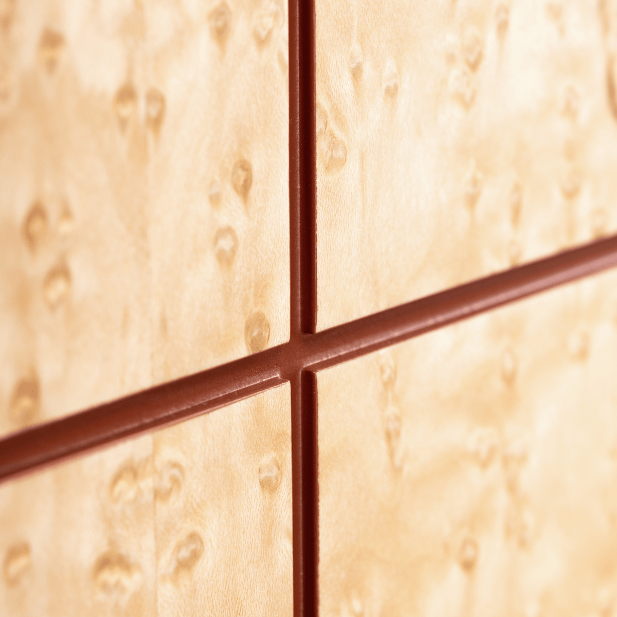 Soft Cage Sideboard close-up of Birds Eye Wood veneer with red lacquer lines