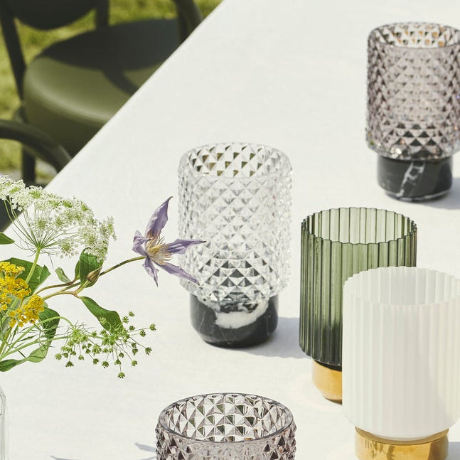 Sons of Marble Candle holder hurricane in Clear and Smoke with green glass and wildflowers