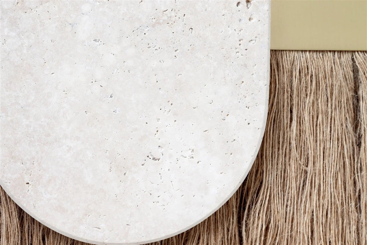 Souk Ecru Mirror Cream close-up of travertine surface over fringe