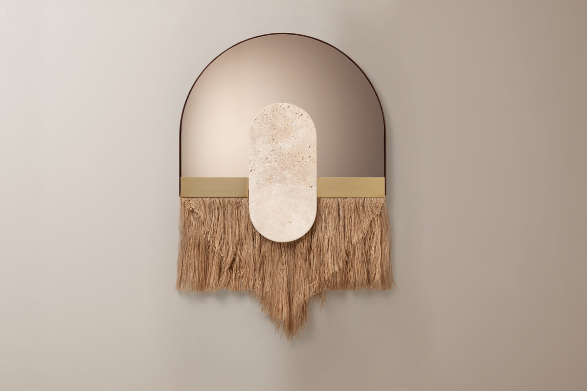Souk Ecru Mirror Linen with pointed fringe on a taupe wall