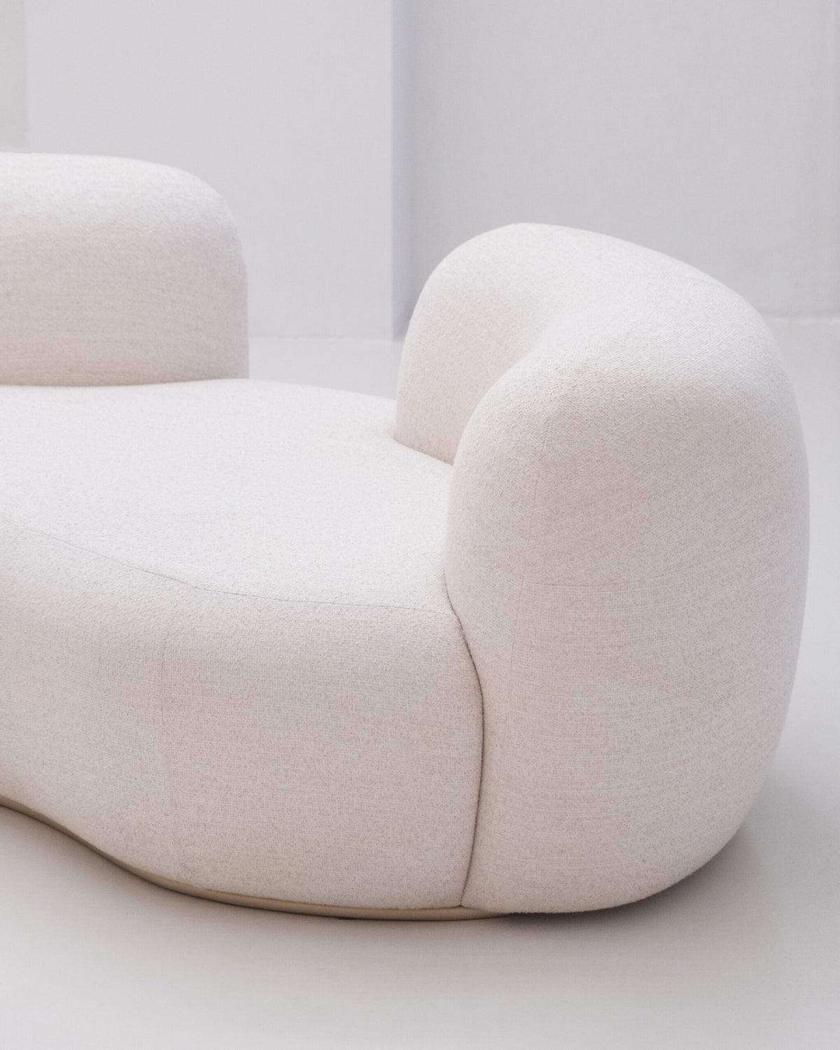 Tateyama Cloud Sofa close-up of the curved bouclé arm