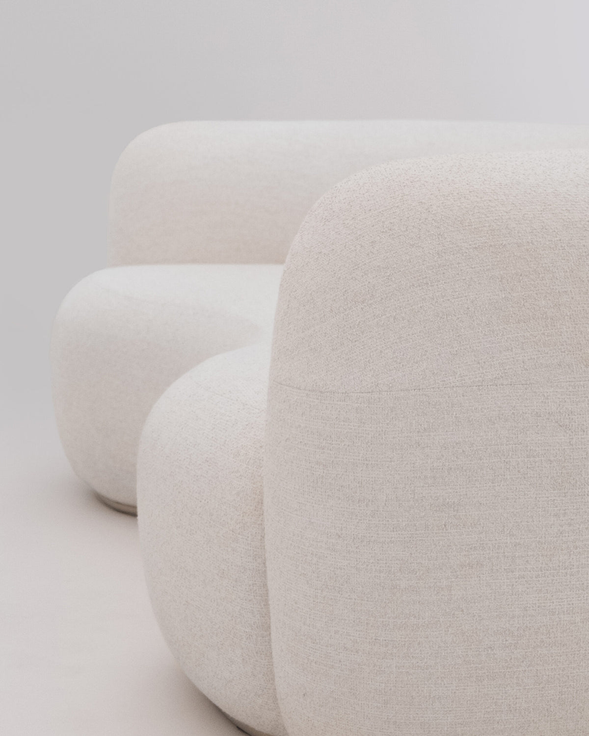 Tateyama Cloud Sofa close-up of rounded bouclé backrest curves
