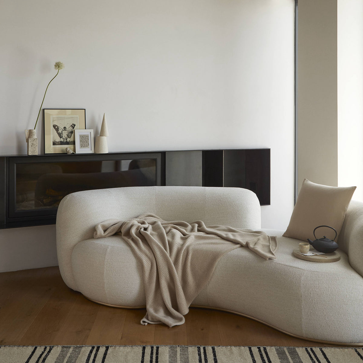 Tateyama Cloud Sofa with throw and teapot tray, styled living room