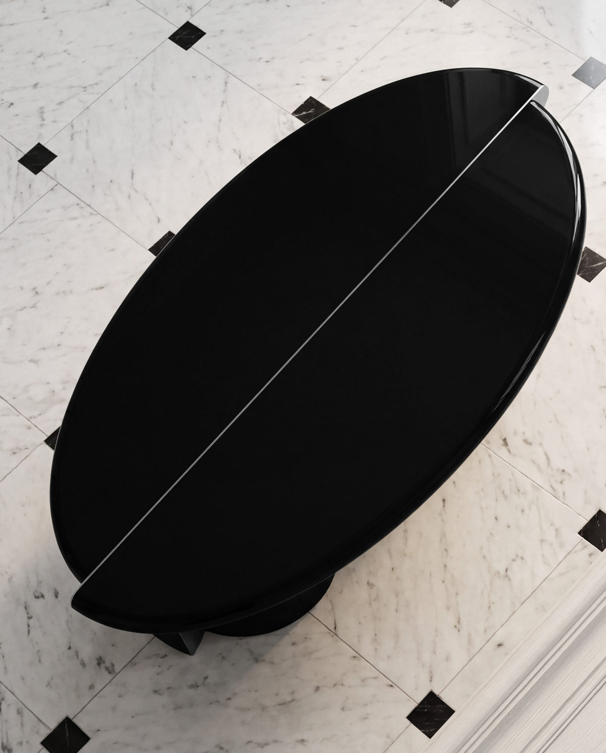 Tayma Coffee Table in black lacquer on a marble floor, top view