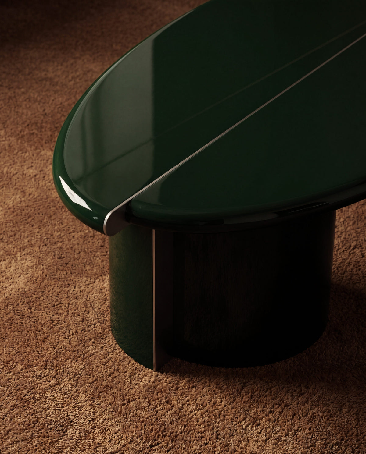 Tayma Coffee Table close-up of the Bottle Green edge on a brown rug