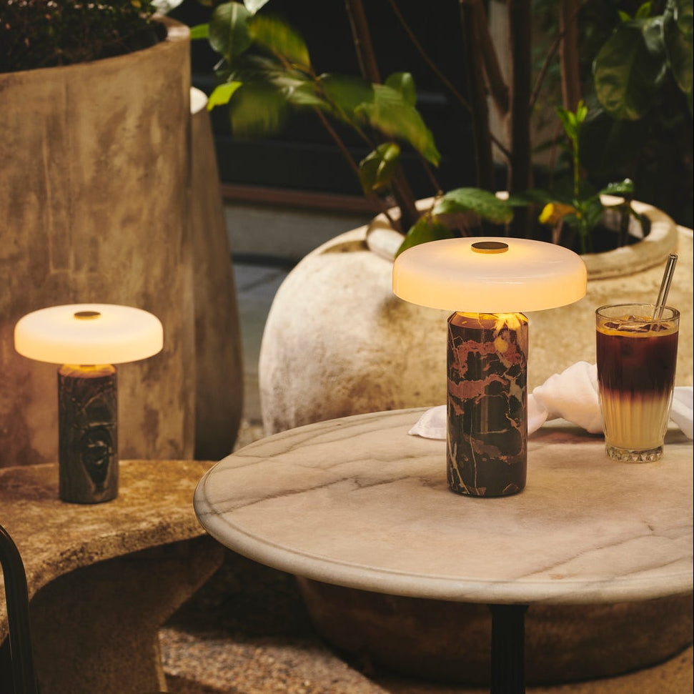 Trip Table Lamp in Dark Clay / Opal and Charcoal / Opal on a round marble table