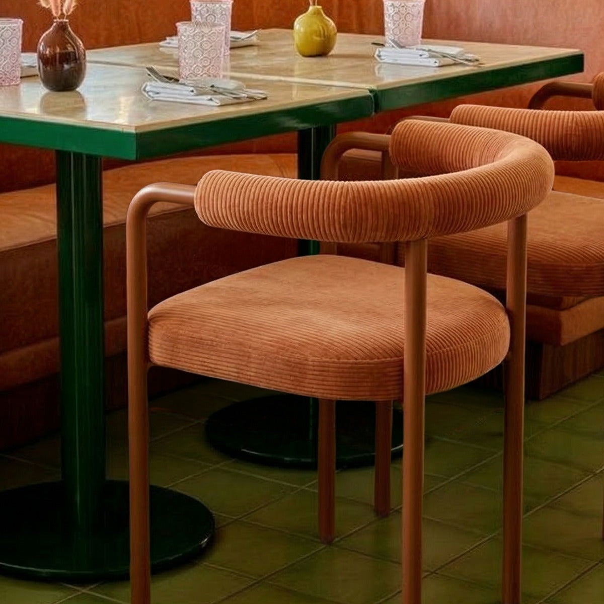 Volta Dining Chair Orion III Terracotta at a dining table by Maison Burgos