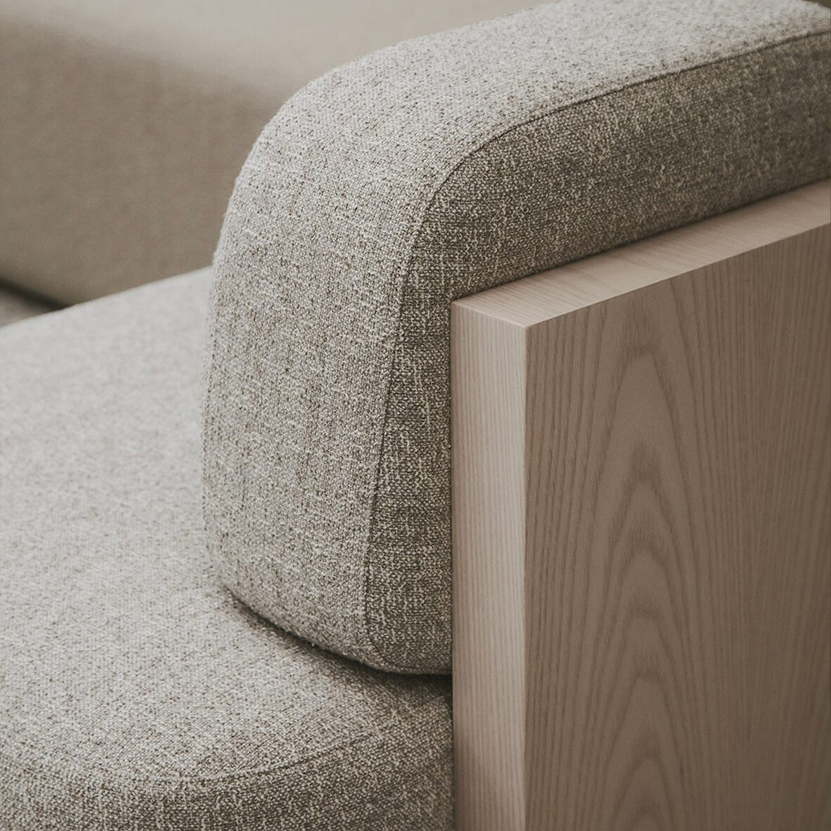 Yoshida Lounge Chair, close-up of the woven upholstery and wood side panel edge