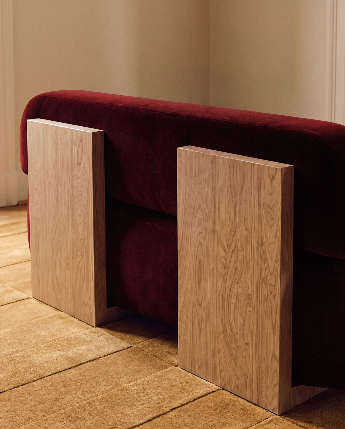 Yoshida Sofa in burgundy velvet with oak back panels